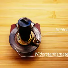 Ein Potentiometer mit Schleifer und Widerstandsmaterial. So funktioniert ein Potentiometer.