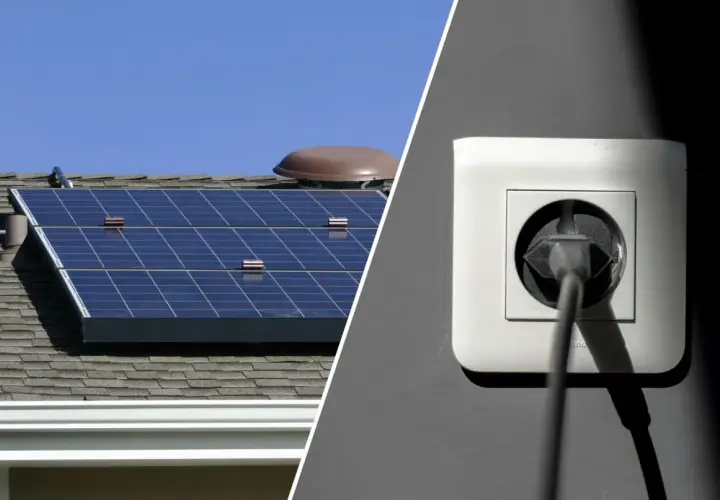 Solarpanels auf einem Dach und ein Stecker in einer Steckdose. Das Balkonkraftwerk speist nicht ein.